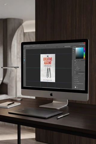 Books and materials in an editorial design workspace